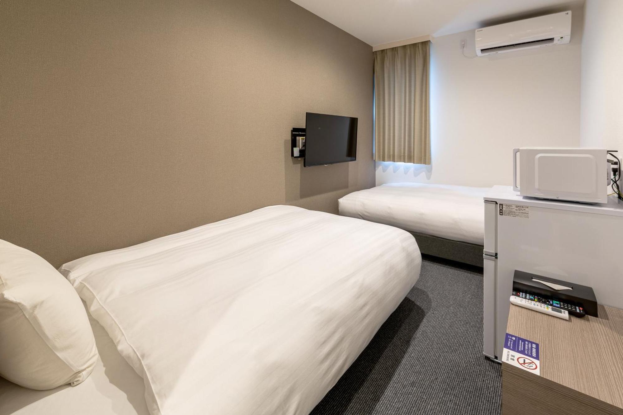 Hotel R9 The Yard Ota Esterno foto